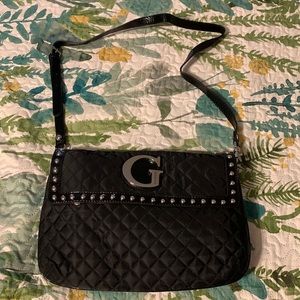 Guess clutch or crossbody bag.  Never been used.